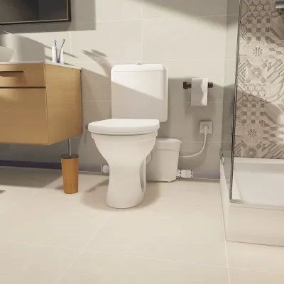 Атмосферное изображение Saniaccess 3, измельчитель для унитаза, установленный за чашей, также отводящий раковину и душ.